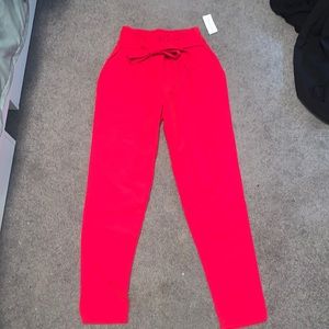 Red tie front pants